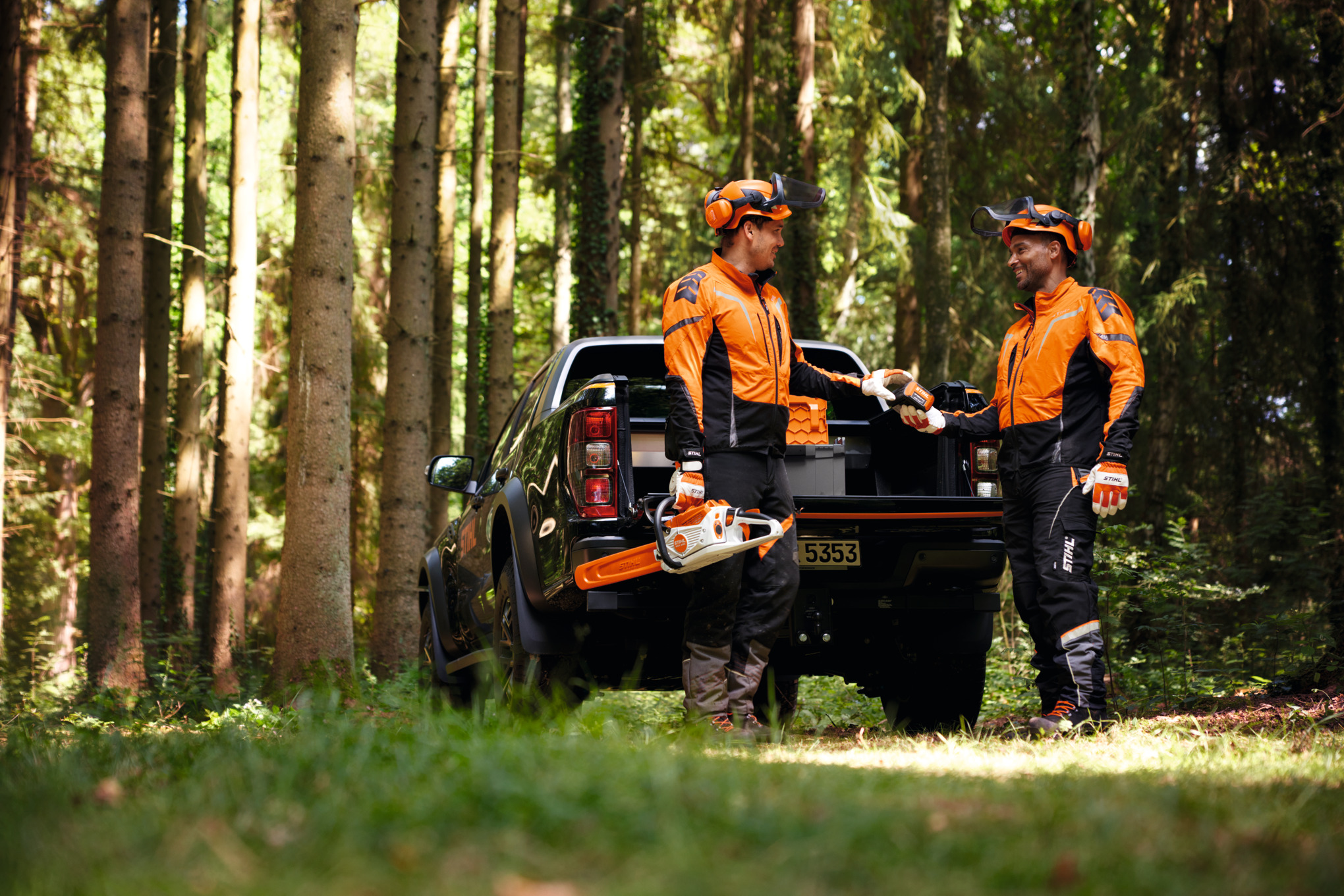 Forestry workers standing in a Forest in STIHL PPE apparel.