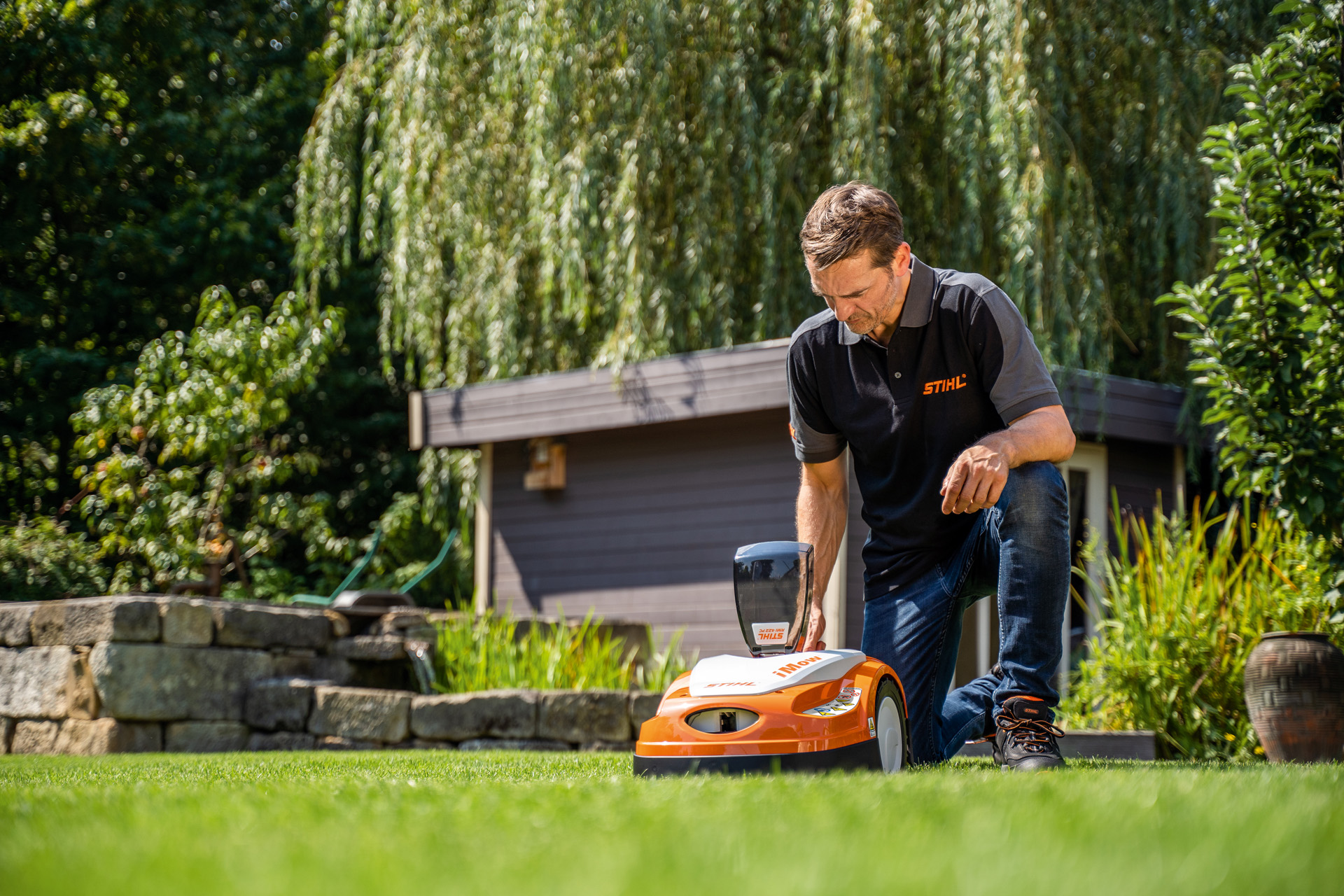 STIHL dealer programming in the mowing plan for a STIHL iMOW robotic mower in a garden